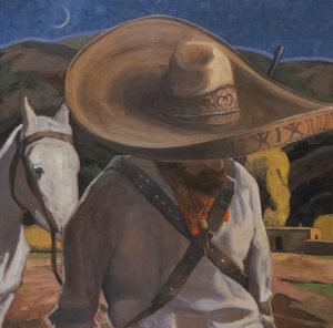 Vaquero Cowboy walking his white horse